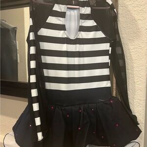 Dance costumes with added rhinestones in good condition